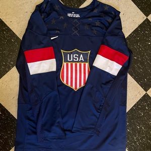 Lightly worn Mens Large USA hockey jersey.